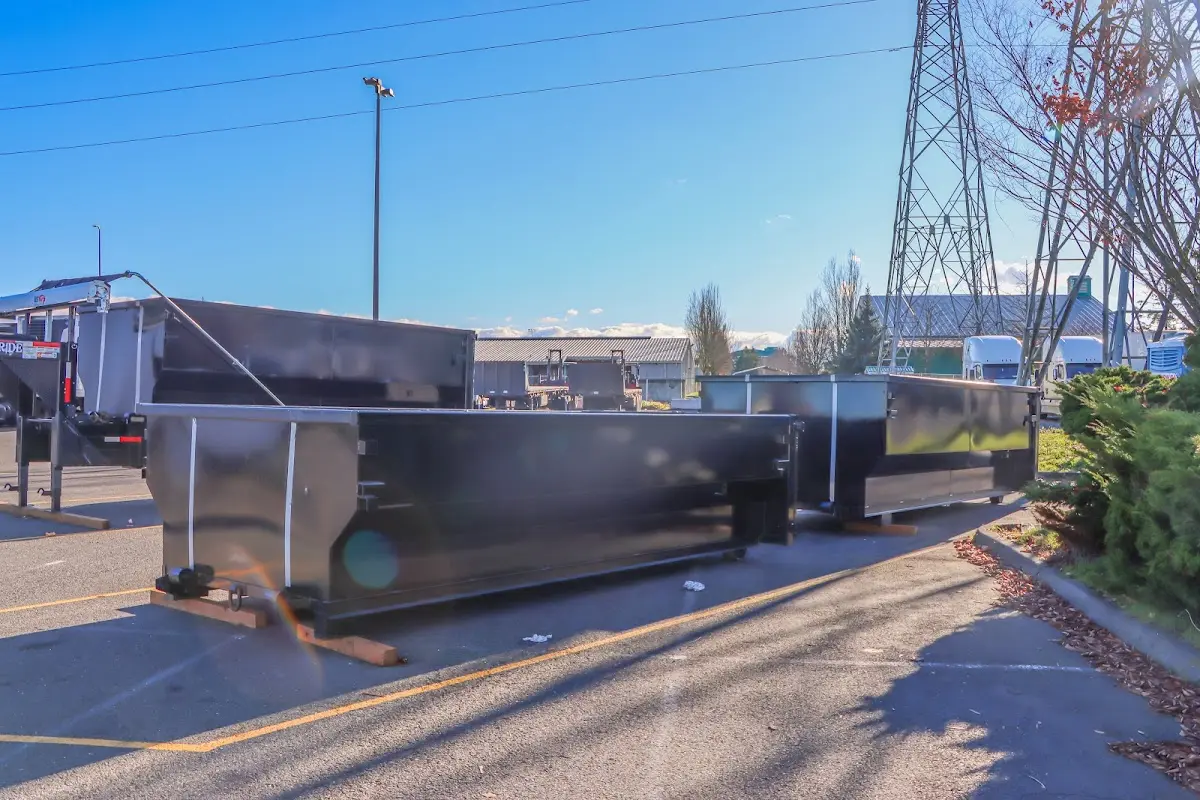 Roll-off dumpster ready for waste disposal at job site for 15 Yard Dumpster Rental in Muskegon